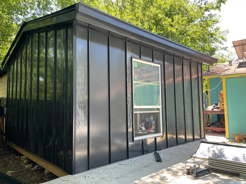 Black standing seam metal wall panels for Roof Inspection in Palmyra